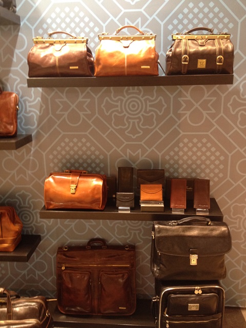 Саквояжи, портфели и портмоне / магазин Tuscany Leather
